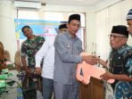 Plt Bupati Aceh Selatan Serahkan BAZIS ke Masyarakat Kurang Mampu