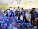 Polres Langsa Kawal Distribusi Bansos Langsa ke Warga Terdampak Covid-19