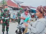 May Day di Tengah Pandemi, DPC FSPTI KSPSI Karo Bagikan Masker Kepada Buruh