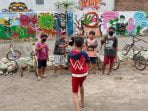 Lukisan Mural Yang Cantik, Jadikan Bronjong TMMD Tempat Singgah Pesepeda