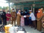 Pemkab Langkat Serahkan Bantuan Korban Kebakaran di Tanjung Pura