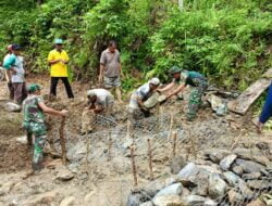 Kodim 0107/Asel Kerja Bhakti Penimbunan Jalan Tani di Samadua